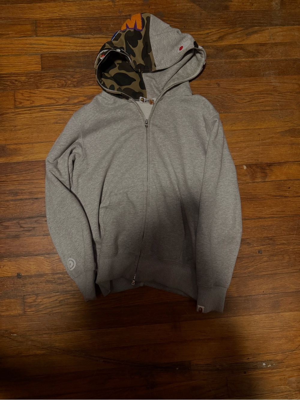 Bape Gray Zip Hoodie with Camo Lined Hood and Orange Accent